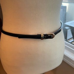 Black skinny belt, gold buckle